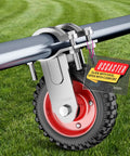 Heavy Duty Gate Wheel 6 Inch Fits Metal Tube Gates One And One Quarter Inch To Two And One Quarter Inch OD Anti Slip Tire Grade Rubber Ball Bearing Caster For Farm Fence Swing Gates 440 Lb Capacity Red mounted on gate