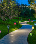 12 Pack Solar Pathway Lights RGB Color Changing Outdoor Garden Lights Auto Color Shifting IP44 Waterproof along curved walkway