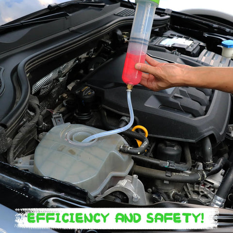 Side view of a 200cc fluid extractor with pink fluid, connected by blue tubing to a car coolant reservoir.
