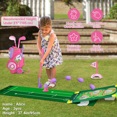 Toddler playing with Toddler Golf Set For Boys And Girls Ages 2 3 4 With Upgraded Kids Golf Cart, Putting Mat, And Cornhole Board, Durable Safe Design, Large 1.8 Inch Golf Balls, Outdoor Indoor Sports Toys Pink, demonstrating hand-eye coordination and fine motor skills on a lawn.