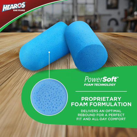 Extreme Foam Earplugs With 33dB NRR 100 Pair Pack, blue hypoallergenic polyurethane foam with tapered design on wooden surface.