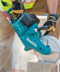 Straight Up Beast Mode 9 Inch Cordless Power Cutter With Brushless Motor cutting through concrete block during renovation.