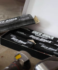 Hook and Loop Sanding Block Set 7 Piece AF44HL Black Heavy Duty Pro Grade Blocks in open box on workshop floor.