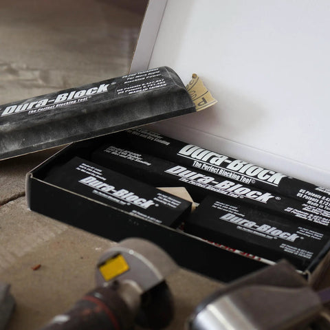 Hook and Loop Sanding Block Set 7 Piece AF44HL Black Heavy Duty Pro Grade Blocks in open box on workshop floor.