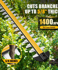 Cordless Hedge Trimmer With 22-Inch Dual-Action Blades, cutting capacity of 5/8-inch, shown trimming bush close up.