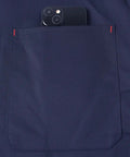 Navy blue pocket of Rugged Lab Coat For Men For DIY And Workshop Jobs with phone, size large, machine washable, wrinkle resistant.