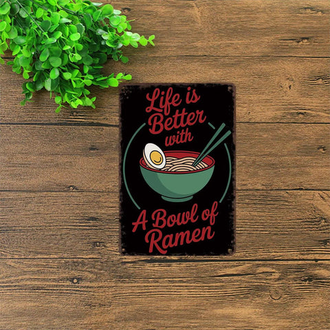 Life Is Better With Ramen Bowl Vintage Metal Sign Tin Wall Art Poster on wooden surface with greenery beside