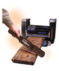 Lumber Wizard 5 metal detector for woodworking, handheld brown handle beside a wood plank and planer.