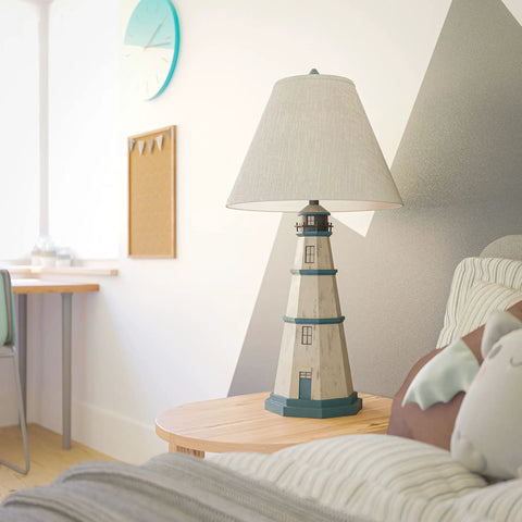 Coastal Nantucket Table Lamp In Antique White Finish, 31 Inch Tall, Nautical Reading Light with lighthouse design, on table