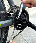 Using Premium Microfiber Cleaning Rope Kit With Lubricating Cream 40 Pack on bike chain for precision maintenance.