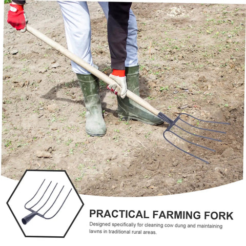 Person using multi functional iron manure fork for maintenance and garden cleanup, handheld tool with durable metal tines