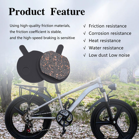 Close-up of Hayes Sole mechanical bicycle disc brake pads, pair with copper-speckled friction surface on black backing