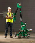 Greenlee 10k Tugger Package Featuring Dual Speed Motor For Faster Pulls, worker with mobile VersiBoom tow rig gear on job site.