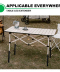 Hella Sturdy 4 Pack Table Leg Extenders For Folding Tables Adjustable Steel Risers Rising From 3.6 To 5.23 Inches on an outdoor table.