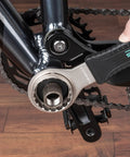 Using 4 In 1 Bicycle Bottom Bracket Tool for quick removal on Shimano Hollowtech II BB9000 bike, showcasing DIY handle grip.