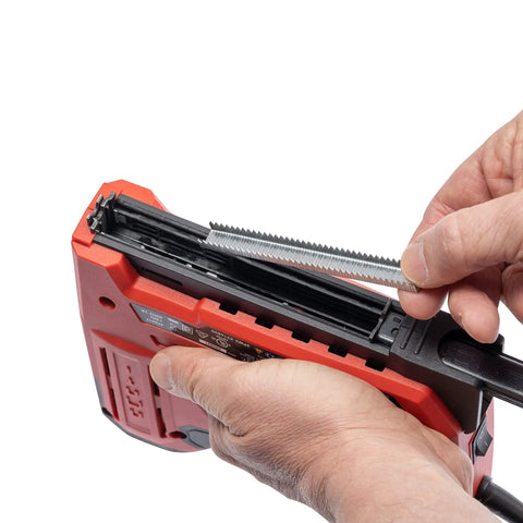 Corded Five In One Pro Grade Electric Staple And Nail Gun for Upholstery with staples being loaded, black and red.