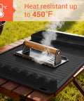 Silicone Grill Mat Two Pack for Blackstone 16x11.5 Inch Non Slip Tool Mats on wooden table with steaming BBQ press