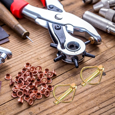Heavy Duty Linch Pin Lock Shaft Fastener Secures Tractor Trailer Axles With Reliable Spring Loaded Action Made From Durable Carbon Steel And Golden Finish For Industrial Jobs And Heavy Work with copper fasteners and tools.