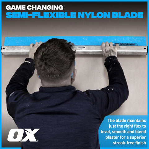 Person using Pro Series ST QuickSkim Plaster Skimming Blade 23 5 8 Inch Semi Flexible High Grade Plastic Blade With Extruded Aluminum Handle
