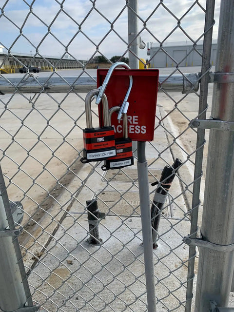 Super Secure Dual Padlock Gate Lock Killing Messy Daisy Chains For Hella Tough Barn Yard Protection Letting Two Different Property Owners Use Their Own Separate Keys on a fenced gate.