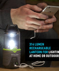 Rechargeable Lantern 314 Lumens With Fast USB Charge In 3 Hours for camping, shown charging a phone using its USB port.