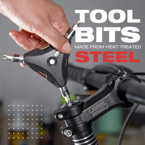 Hand using 13 In 1 Y Wrench Bicycle Multi Tool With Interchangeable Allen Hex Torx Flat Head And Phillips Bits on a bike handle