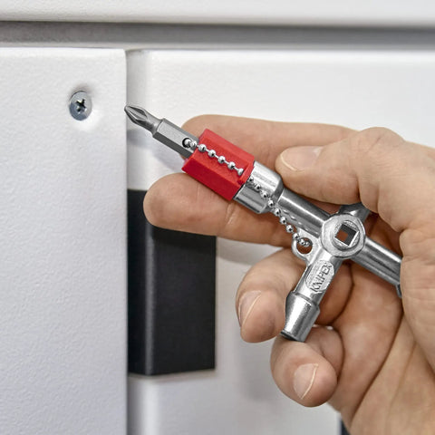 Hand using Handy Universal Control Cabinet Key for Gas, Water, and Electric Shutoff Systems with Slot 10x7 Bit, Phillips PH2.