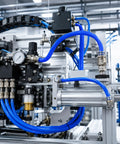 Heavy Duty 5/8 Inch Silicone Heater Hose 16 Foot Long High Temp Reinforced Radiator Line connected to industrial machinery.