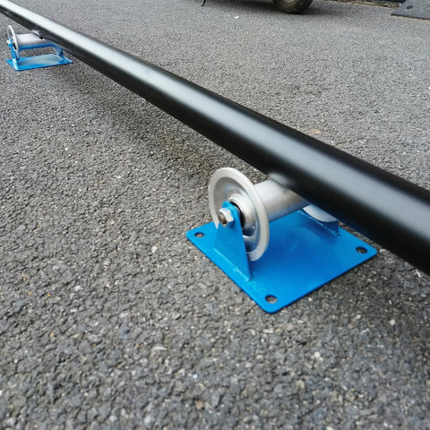 Beefy Heavy Duty Cable Puller Sheave For Large Scale Laying Industrial Pipe Feeding Pulley Pipeline Sliding Tool Pipe Roller on asphalt