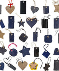 Various shapes of denim and burlap tags with strings and grommets for DIY crafts and projects displayed on a white background.