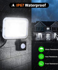 JUDYSSY Led Pir Floodlights 20W, Ip67 Waterproof Security Light with Motion Se mounted on wall, showcasing water resistance features.