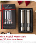 Battery Operated Salt And Pepper Grinder Set With Light Stainless Steel Mills in gift packaging on wooden table