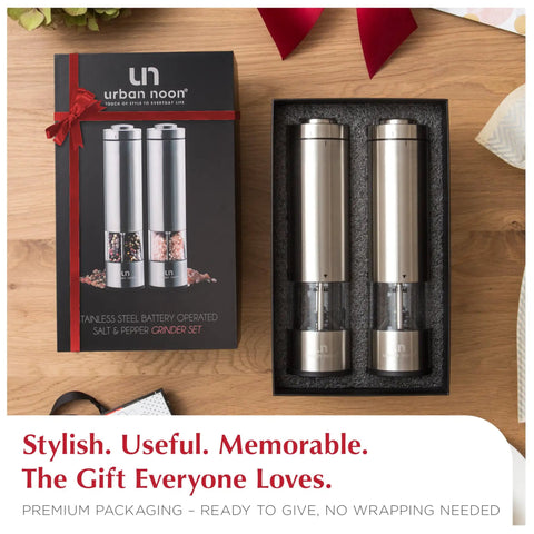 Battery Operated Salt And Pepper Grinder Set With Light Stainless Steel Mills in gift packaging on wooden table