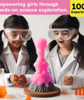 Girls Science Kit With 100 Plus Experiments For Kids Ages Five To Eight Safe Hands On STEM Activity Set That Makes Science Fun And Easy To Explore At Home girls in lab coats with goggles around a pink volcano experiment