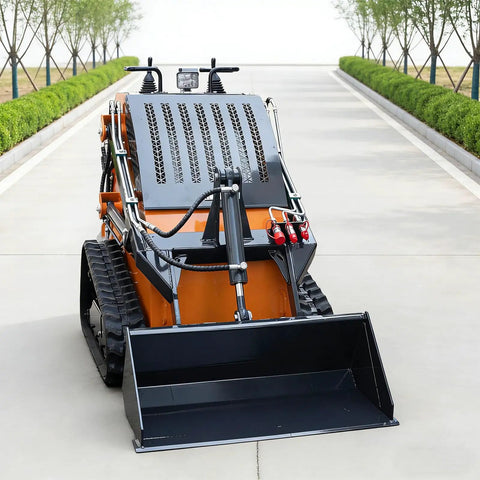 Front view of tracked mini skid steer loader with backhoe attachment for infrastructure construction and dock loading on urban streets