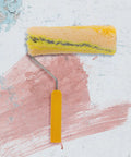 Heavy Duty Cotton Thread Paint Roller With Zero Hassle Grip And Smooth Roll Action Built To Make Rough Surfaces Look Completely Fresh For Any Weekend Warrior Project on textured wall backdrop.