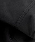 Close-up of black 600D poly fabric on One Size Fits All Carpenter And Framer Construction Rig With Suspenders And Two Bag Tool Belt 24 Pockets