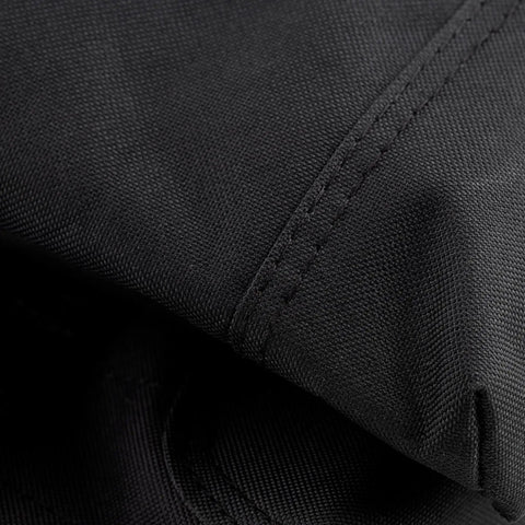 Close-up of black 600D poly fabric on One Size Fits All Carpenter And Framer Construction Rig With Suspenders And Two Bag Tool Belt 24 Pockets