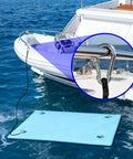 Heavy Duty 118 Inch Lily Pad Bungee Cord With Floating Locking Carabiners securing water pad to boat, dockside view