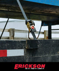 No Nonsense Retractable Ratcheting Tie Down Straps 2 Pack Black 1 In X 6 Ft With Vinyl Coated Hooks on a trailer.