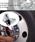 33mm Push On Lug Nut Covers 60 Pack For Truck Wheels, chrome plastic caps being installed on truck wheel bolt