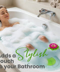 Flower Power Bathtub Drain Stopper With Chain Pink Green Universal 4 1 4 Inch Bath Plug in use in bubble-filled tub.