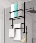 Over the Door Towel Rack for Bathroom Three Tier Behind Door with Hook Matte Black displaying towels and brush