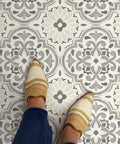 Feet on Grey And Cream Peel And Stick Vinyl Floor Tiles For A Modern Farmhouse Vibe No Tools Needed Easy Install With Permanent Adhesive