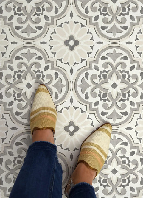 Feet on Grey And Cream Peel And Stick Vinyl Floor Tiles For A Modern Farmhouse Vibe No Tools Needed Easy Install With Permanent Adhesive