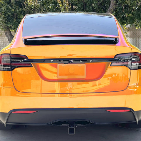 Orange 8K Mirror Polished Stainless Steel License Plate Frame With Rust Resistant Build on car rear view
