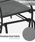 Close-up of Outdoor Glider Bench For Patio And Backyard With Steel Frame That Handles 400 Lbs Two Person Loveseat Swing Rocker in Gray