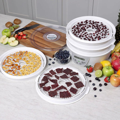 Smooth Operator Digital Electric Food Dehydrator With Stackable Trays showing dried beef jerky and fruit slices on trays.