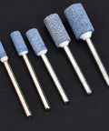 100 Piece Workhorse Polishing Stone Head Set For Grinder Burr Bits With 3mm Shank, various sizes on black background