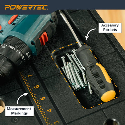 Close-up of a heavy-duty portable folding work table top showing accessory pockets, screws, and measurement markings.